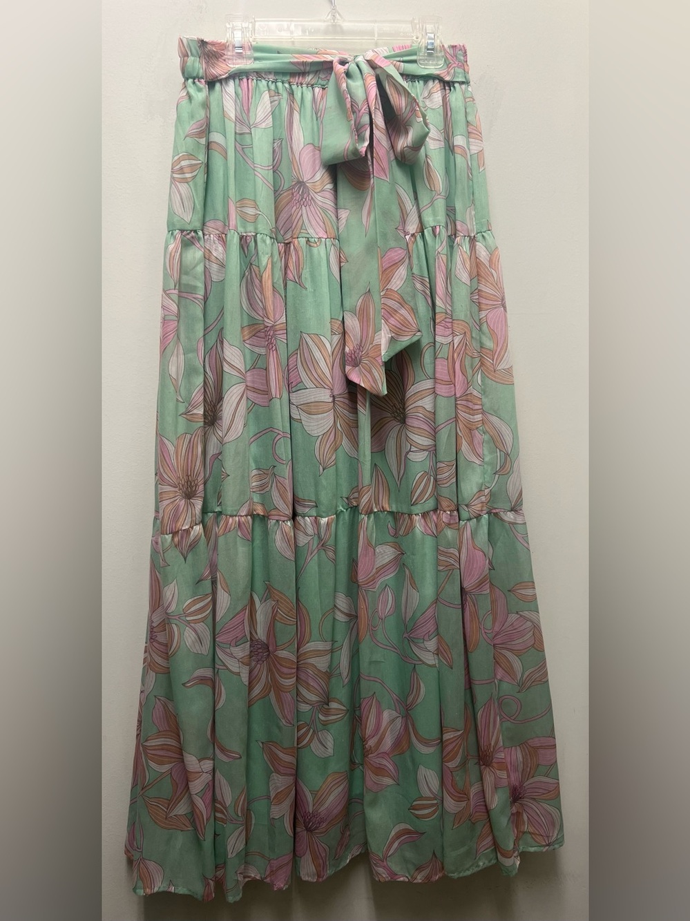 Her destiny sage long Rose Skirt features a tiered silhouette and a waist tie